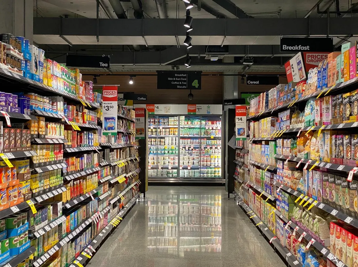 A picture containing text, scene, indoor, marketplaceDescription automatically generated