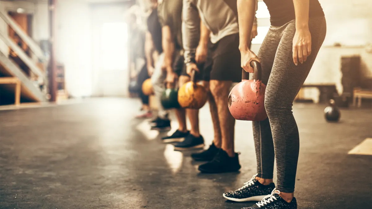 Strength training session with participants using weights.