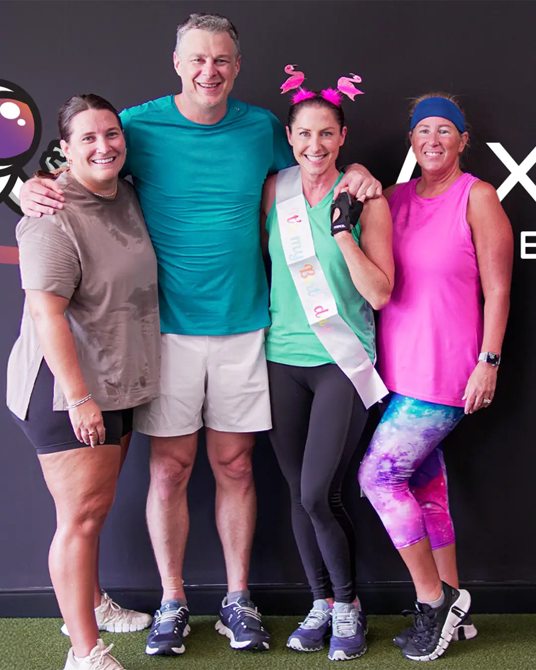 Community-focused fitness group at Galaxy Fit Lab Naples - celebrating client success with team support and motivation